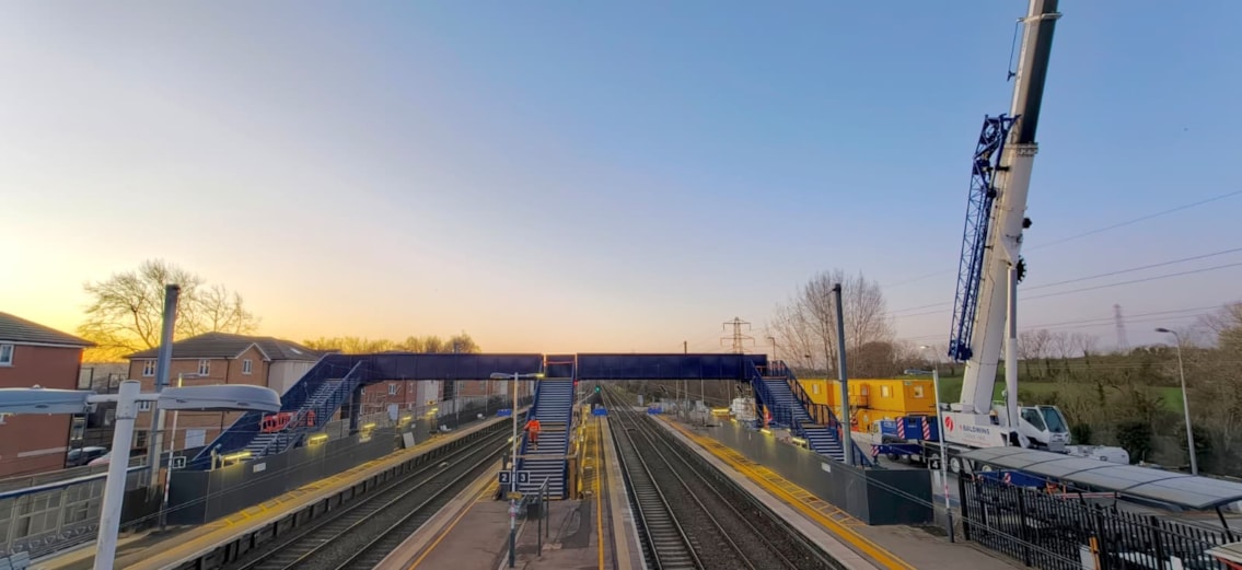 Sun rises on new footbridge at Harlington