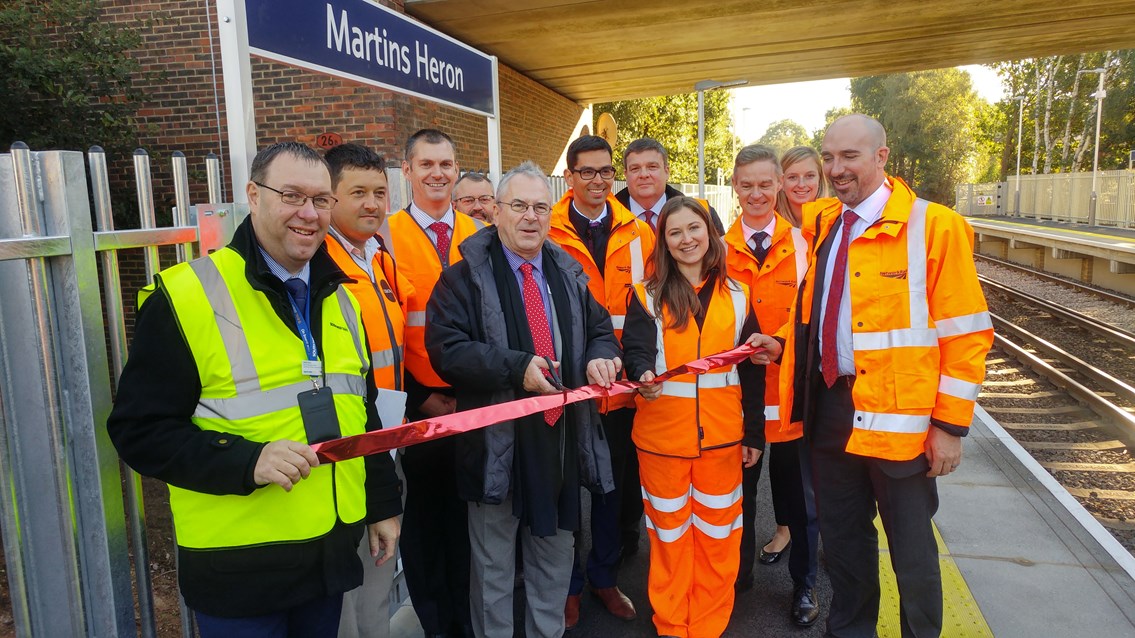 Longer platforms for longer trains: Network Rail completes Berkshire station upgrade: Sir Peter Hendy, Chairman of Network Rail, is joined by Stuart Kistruck, Network Rail's Route Managing Director, as wells as representatives from South West Trains and members of the project team to officially mark the opening of the new, longer platforms at Martins Heron station. Also photographed are: Dave Josey, South West Trains station manager; Tatiana Kotrikova, Network Rail scheme project manager; Adam Piddington, deputy customer service director, South West Trains; Zen Nichols, senior programme manager, Network Rail