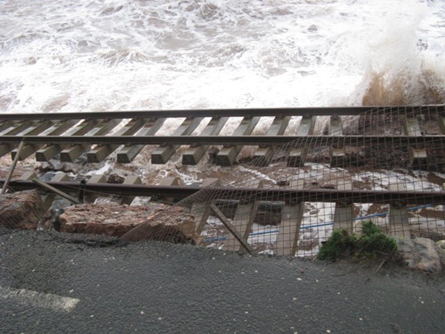 Damage to the railway at Dawlish in Devon: Severe damage to the sea defences and railway at Dawlish in Devon caused by major storms