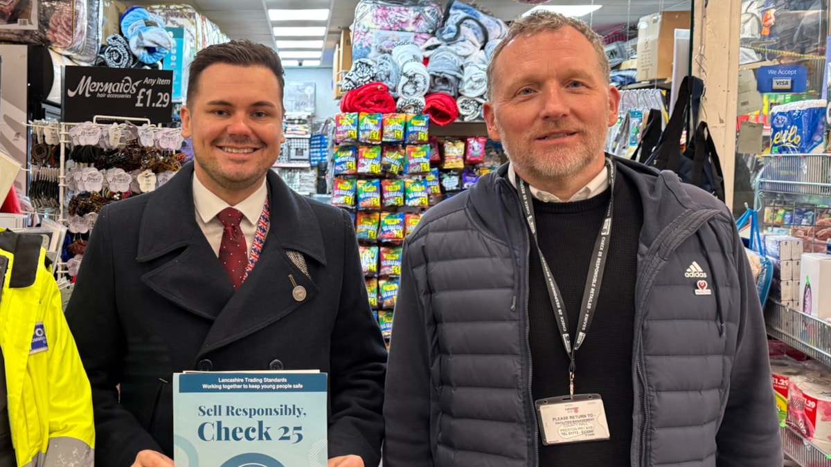 LCC's cabinet member Joshua Roberts and Trading Standards officer Jason Middleton