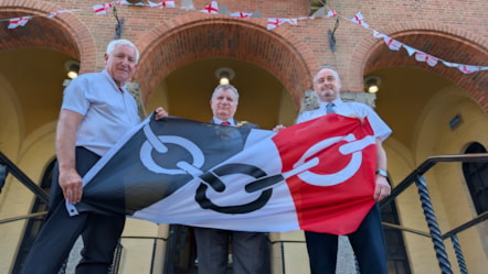 Leader, Mayor and deputy leader with Black Country flag