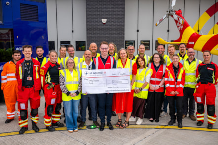 First Bus present cheque for £20,000 to Air Ambulances UK