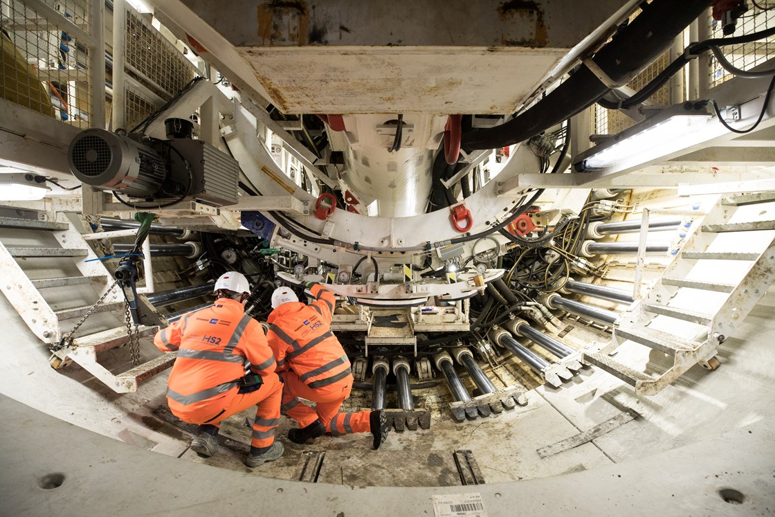 Engineers assemble  HS2 TBM 'Lydia' at Atlas Road, London: Two engineers from HS2's contractor, Skanska Costain STRABAG JV assemble the 847 tonnes tunnel boring machine (TBM). Parts of the TBM were previously used on London's Crossrail project and have been refurbished for HS2. 

The logistics tunnel will support the construction of the HS2 twin-bored running tunnel - the Euston tunnel - between Old Oak Common and Euston station. 

Tags: TBM, Segments, Construction, Stations, Tunneling, Logistics, Environment, Sustainable, Reuse