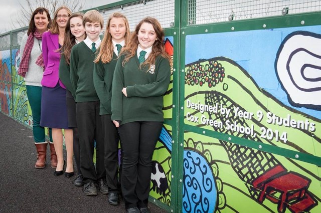 Mural on Highfield Lane footpath: Teachers and pupils from Cox Green School in front of the mural on Highfield Lane footpath designed by pupils from the school.