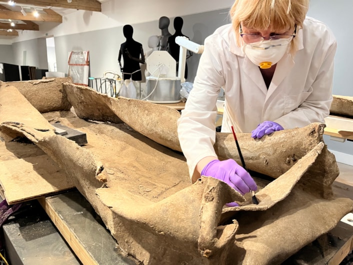 Saxon cross: A lead coffin which was buried for more than 1,600 years before it was discovered in a previously unknown cemetery site near Garforth alongside the remains of more than 60 individuals from late Roman to early Saxon periods.
