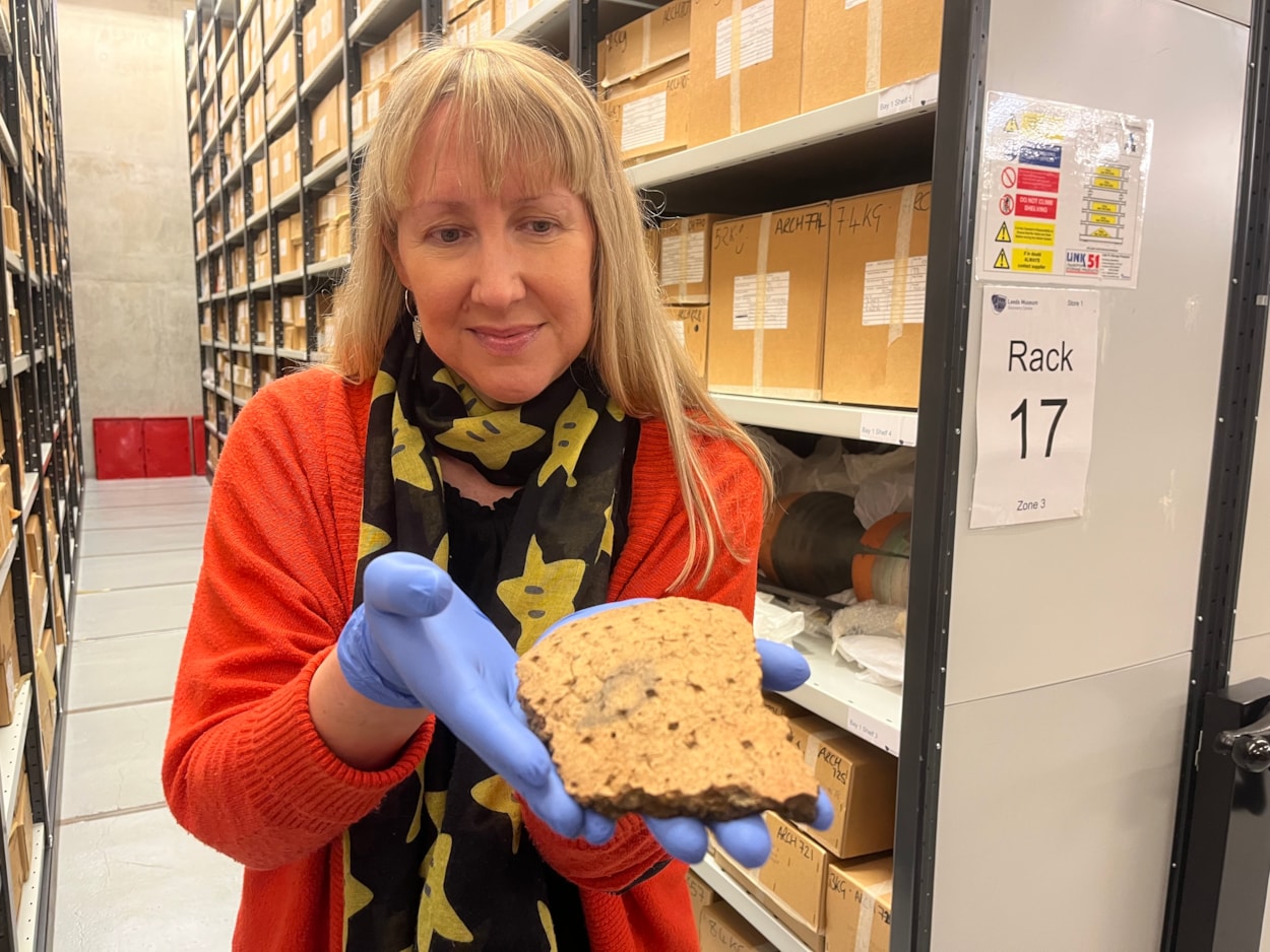 Pitty Close Farm finds: Kat Baxter, Leeds Museums and Galleries’ curator of archaeology, with fragments of a decorated clay urn found at Pitty Close Farm in Leeds.