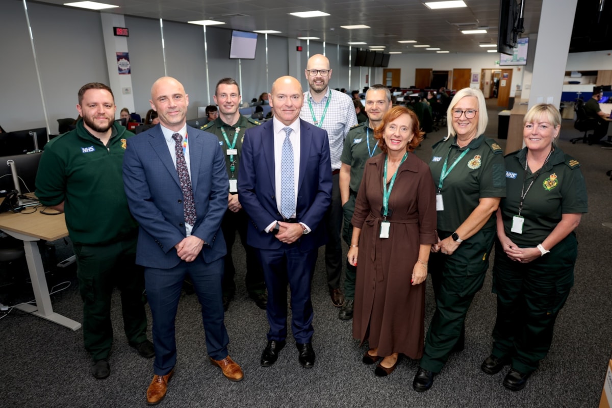 Sir Jim Mackey (middle) with (l-r) Mark Richardson, Kev Scollay, Darren Green, Chris Dawson, Stu Holliday, Barbara Wells, Lynn Huldie and Julie Horner