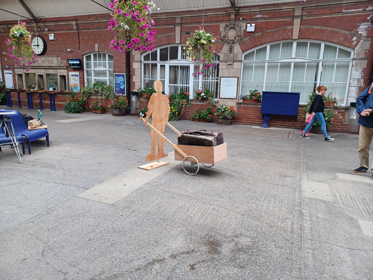 This image shows the scale model of the Barrow Boy sculpture at Bridlington