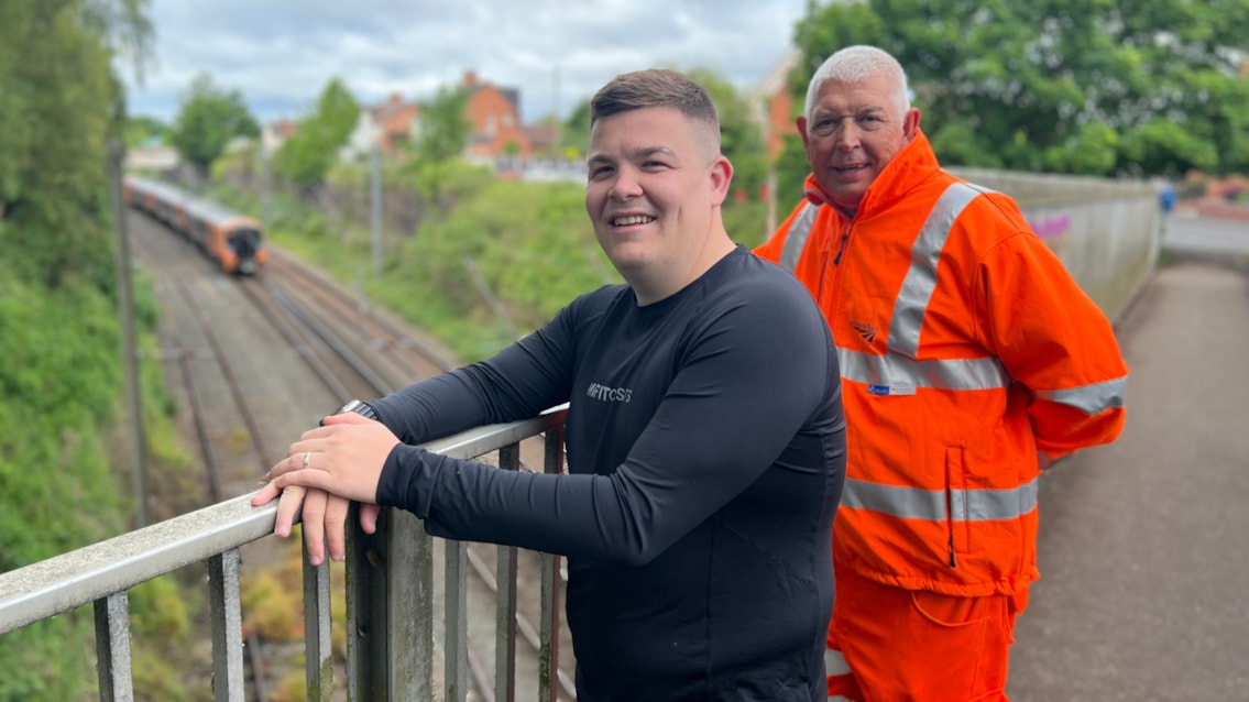 Lucky man reunited with wedding ring after its 'slow motion' drop onto railway: Ben Harris and Mark Samson