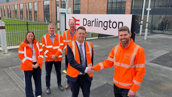 Network Rail's Luke Durston (right), hands over Darlington station to LNER's Steve Wilson on completion of the upgrade project in May