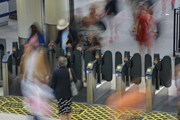 Customers going through ticket gates at Waterloo station 3: Customers going through ticket gates at Waterloo station 3