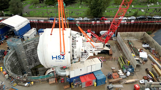 Aerial shot of the middle shield of TBM Emily being lifted at Victoria Road