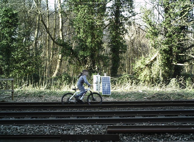 Child cycling on the railway in West Yorkshire
