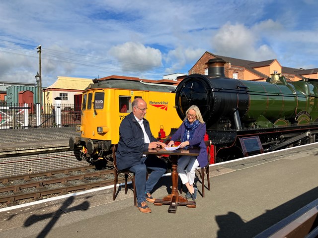 Gus Dunster and Denise Wetton sign the first-of-its-kind partnership between a heritage railway and Network Rail: Gus Dunster and Denise Wetton sign the first-of-its-kind partnership between a heritage railway and Network Rail
