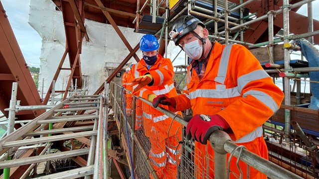 North Queensferry June 21: Mr Dey (left) views the repainting works