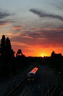 WORKING TOGETHER, SMARTER AND SIMPLER: HOW TO CUT THE COST OF NEW TRAINS: Chiltern service in Oxfordshire countryside