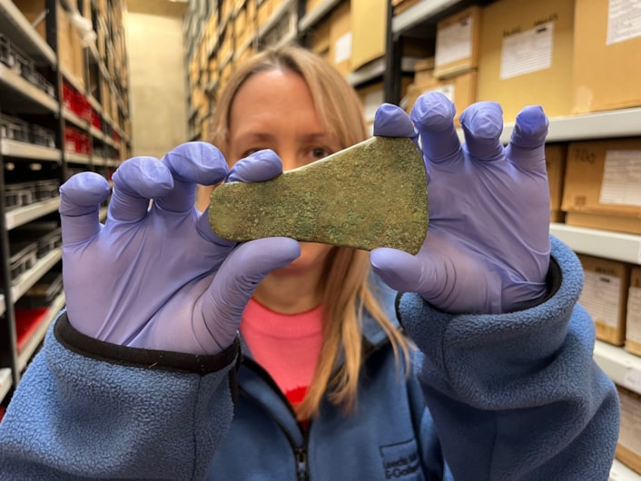 ELOR archive: Among the discoveries was a bronze alloy flat axe head, believed to be more than 4,000 years old. Kat Baxter, Leeds Museums and Galleries' curator of archaeology is shown here with the find.