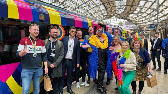 Liverpool Lime Street becomes gateway for Eurovision superfans: Eurovision superfans getting off specially branded London Northwestern Railway train at Lime Street May 9