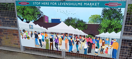 This image shows art at Levenshulme depicting the market