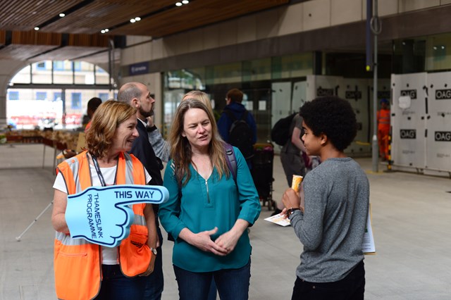 Volunteer: A Thameslink Programme volunteer offers assistance