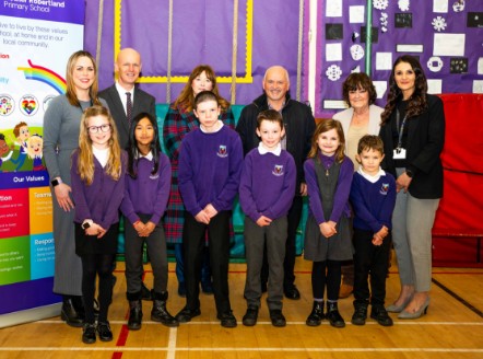 Cllrs Cowan, Canning and Freel with Hannah, Noah, Orran, Olivia, Lena, Alfie, HT Mrs Beveridge, DHT Mrs Lindsay and Graham McGinn