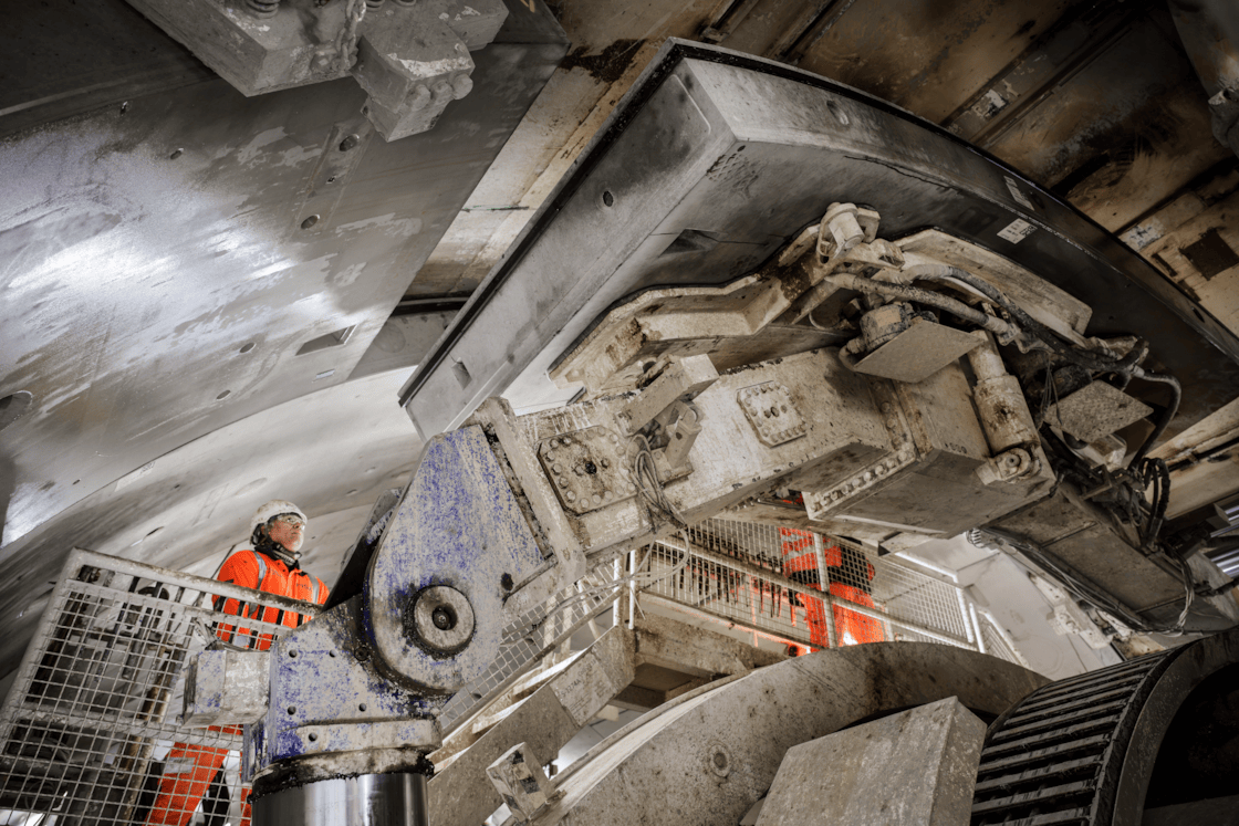 A concrete tunnel ring segment is moved into place by TBM Sushila to create HS2's Northolt Tunnel