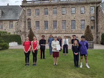 Pupils from Elgin Academy and Gordonstoun launch the Moray Badge Platinum Jubilee with Lords-Lieutenant of Moray and Banffshire; Deputy Lieutenant Joanna Grant Peterkin (Chair of the Moray Badge Platinum Jubilee); Elgin Academy Head Teacher, Kyle Scott; Principal of Gordonstoun, Lisa Kerr; and Convener of Moray Council, Cllr Shona Morrison