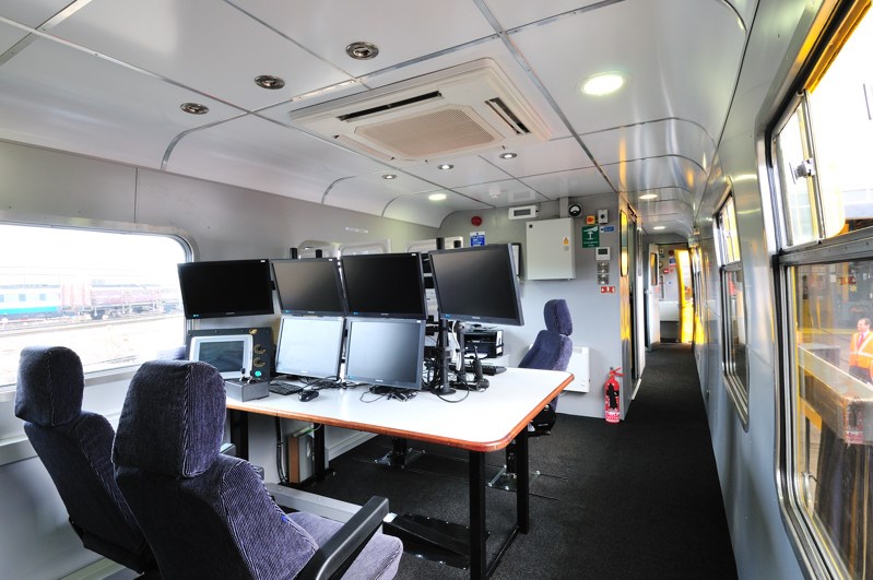 Inside Network Rail's new ultrasonic unit: Inside Network Rail's new ultrasonic test train - monitors show technicians live data recorded from the track below their feet