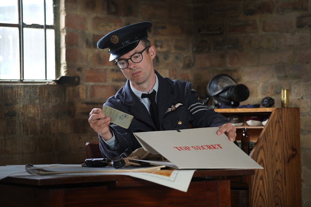 Historical re-enactor Terence Finnegan makes final preparations for a new escape room experience the National Museum of Flight. Image © Stewart Attwood (5)