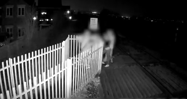 Wilthorpe 3 - holding gate closed to prevent exit: Wilthorpe 3 - holding gate closed to prevent exit
