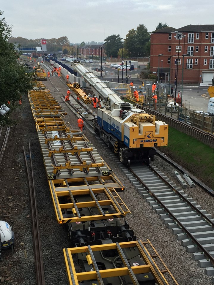 Kirow crane putting track in place at Bromsgrove