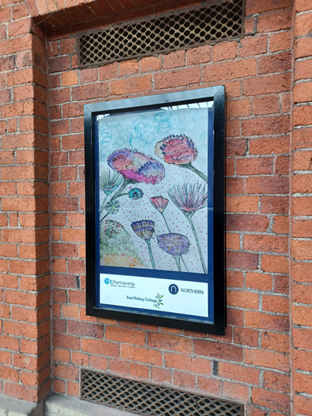 This image shows floral artwork at Beverley station