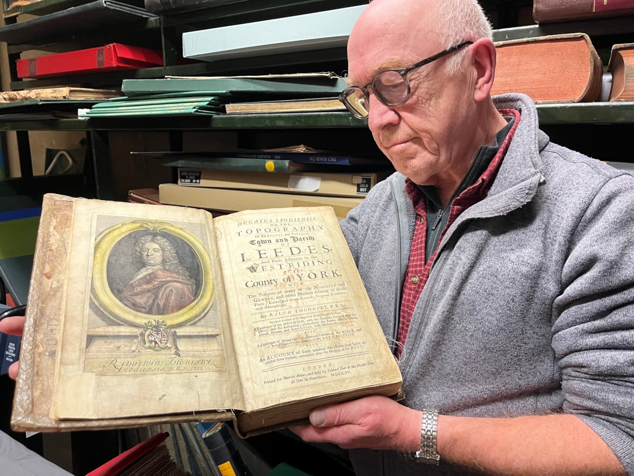 Leeds histories: Library and digital assistant Phil Wilde with Leeds Central Library’s one-of-a-kind edition of famed historian Ralph Thoresby’s Ducatus Leodiensis.
Printed in the mid-1740s, the incredible book will be on display at the library until the New Year.