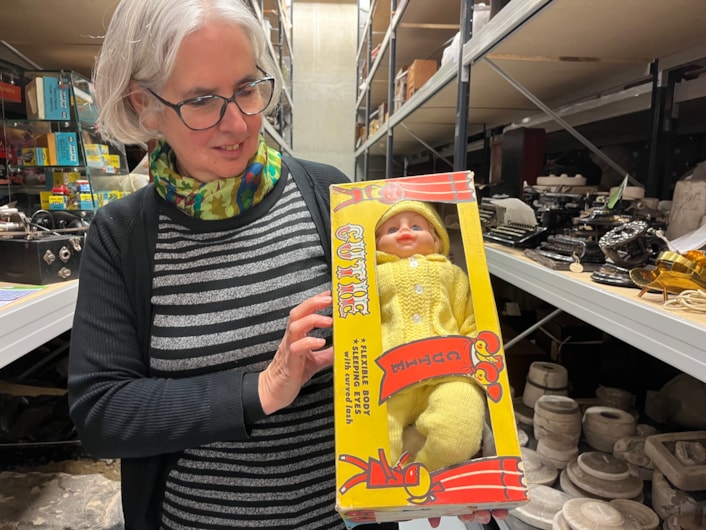 Biscuit messages: As well as the biscuit messages, other festive objects which have been recently donated to Leeds Museums and Galleries include a late 1960s Cutie doll, gifted to a child whose family was homeless in 1969 as part of the Leeds and District Workpeople’s Hospital Fund’s annual Christmas appeal. Held here by curator Kitty Ross, it still carries the note “To Denise Xmas 1969, from mummy and dad.”
