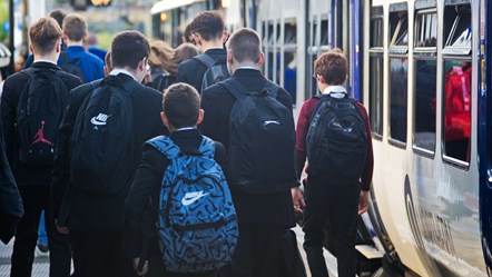 Image shows schoolchildren commuting to school