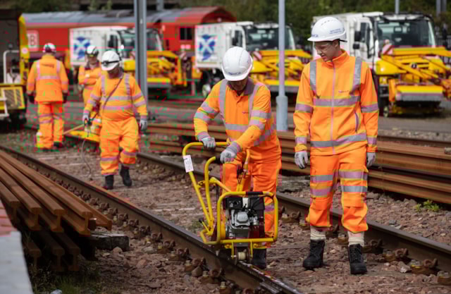 Autumn - Leaf Busting Team cleaning rails-2: Autumn - Leaf Busting Team cleaning rails-2