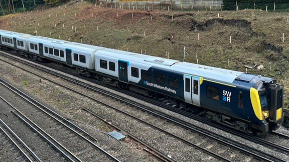 REMINDER: South Western Railway customers planning on travelling over the festive period urged to plan ahead and check before they travel: South Western Railway train through Woking