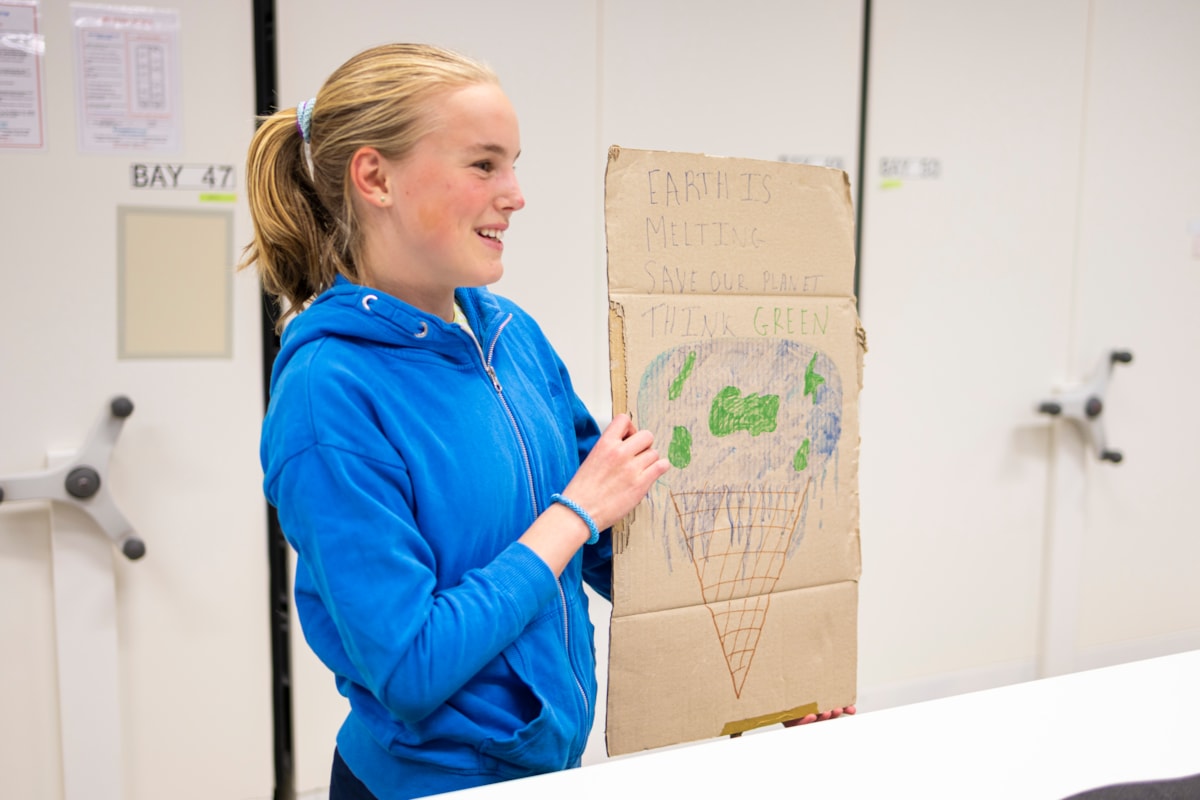 Bridget, aged 14, with her School Strike for Climate placard at the National Museums Colletion Centre. Photo (c) Duncan McGlynn (3)