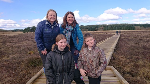 Blawhorn boardwalk extension opens: Blawhorn Moss Reserve Manager Amee Hood and Dr Heather Reid with pupils from Blackridge Primary School on the new boardwalk extension.