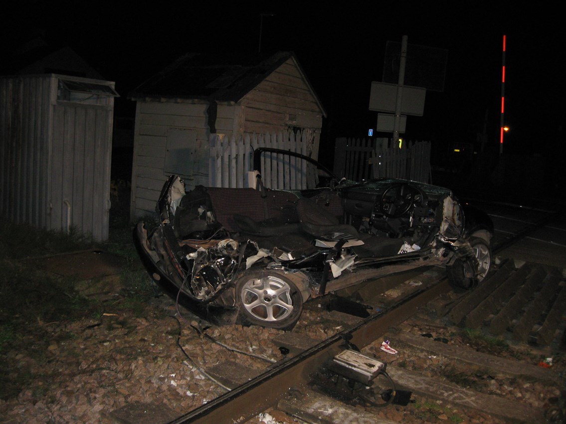 Remains of car after smash with train at Sandhill level crossing near Cambridge: Remains of car after smash with train at Sandhill crossing, Cambs.
