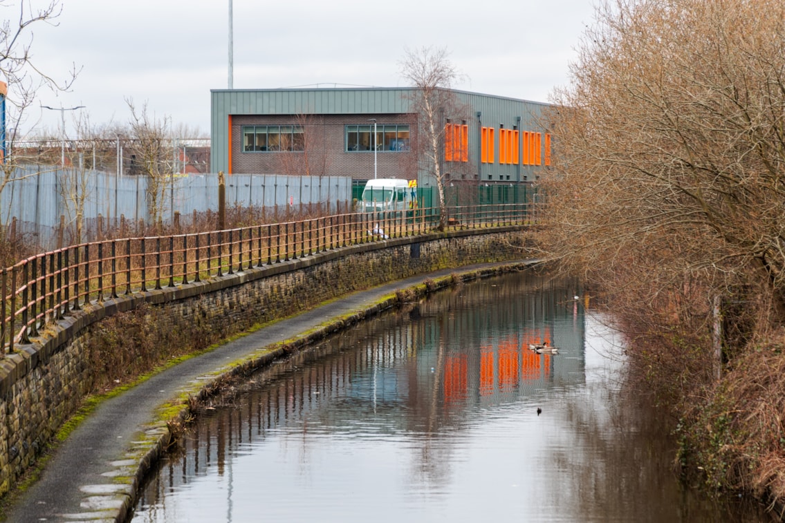 View by canal at Guide Bridge depot