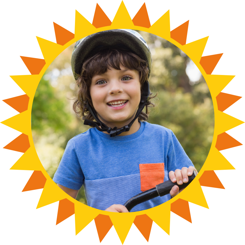 Heatwave 2020 image showing a child in a cycle helmet