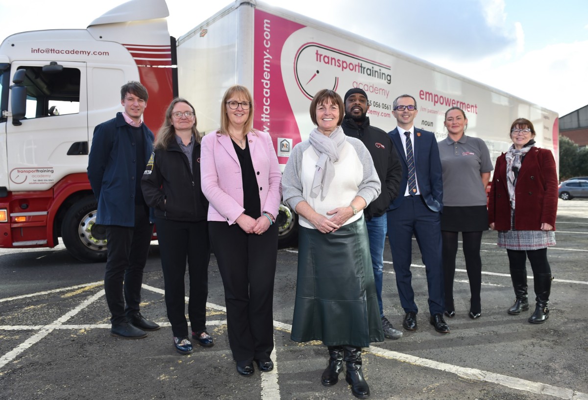 Skills Bootcamp Officer Lancashire Skills and Employment Hub Stephen Norman, Head of Logistics Instruction and Driver Development at  the Transport Training Academy Julie Ann Kirkham, Director of the Lancashire Skills and Employment Hub Michele Lawty-Jones, Leader of Lancashire County Council Phillippa Williamson, Skills Bootcamp in HGV learner Glenroy Glabes, County Councillor and Cabinet Member for Economic Development & Growth Aidy Riggott, Director of the Transport Training Academy Lauren Scanlin and County Councillor and Cabinet Member for Education and Skills Jayne Rear, pictured from left to right at the Lancashire Business Park in Leyland.