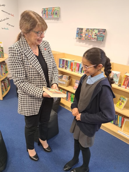 County Councillor Jayne Rear, cabinet member for Education and Skills, talking to a Y6 pupil taking part in this year's Fantastic Book Awards at Deepdale Community Primary School in Preston