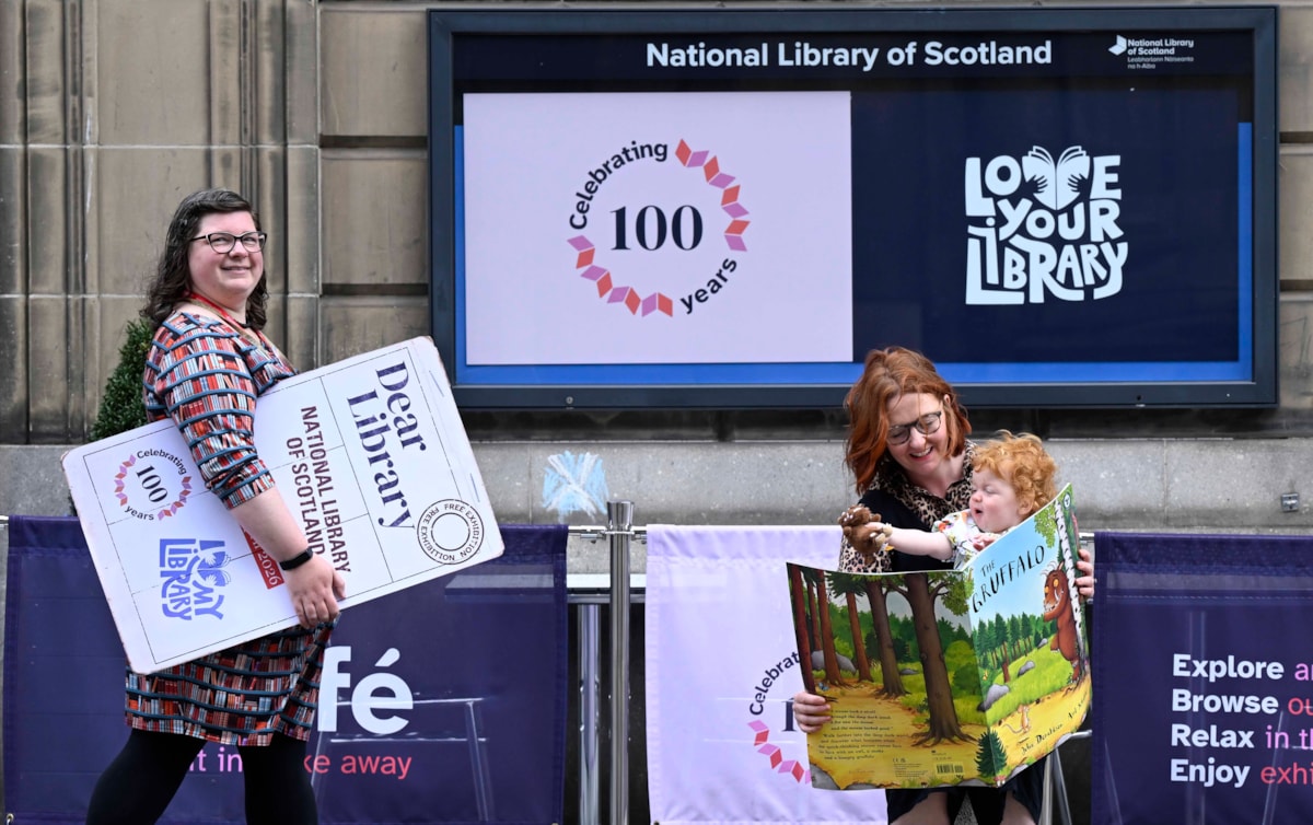 Susannah Leake, librarian from Wester Hailes Library who has contributed to the exhibition Dear Library, outside the National Library of Scotland on George IV Bridge in Edinburgh, with Jo Stevenson and one-year-old daughter Maggie.