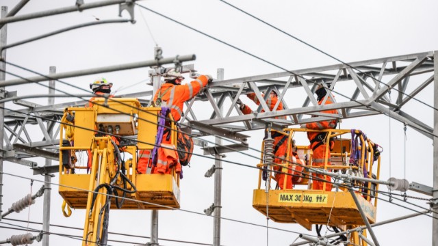 Overhead wires being installed-2: Overhead wires being installed-2