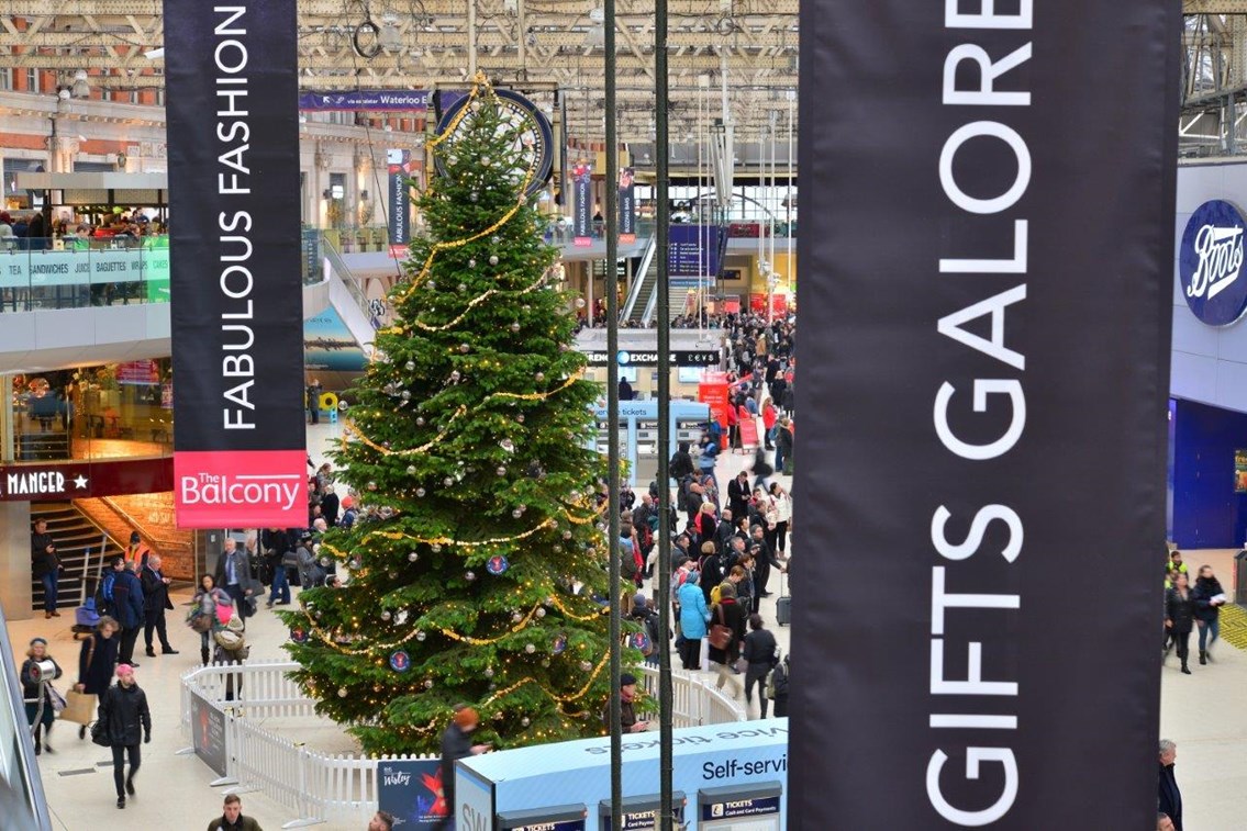 Waterloo railway station with Christmas tree and banners