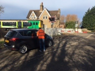 NR staff at Marston level crossing