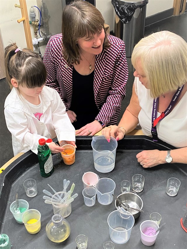Early Learning and Childcare Expansion Programme: Children's Minister Maree Todd takes part in a science lesson with a child and member of staff at Tower View Nursery in Glasgow