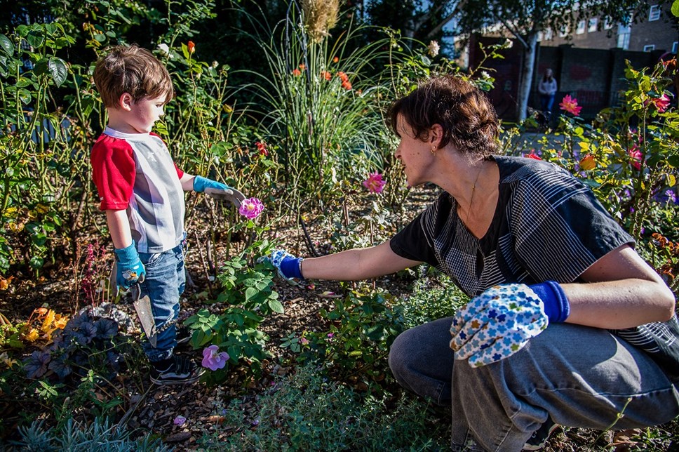 A woman and child in Graham Street Park, which was recognised with a Green Flag Community Award